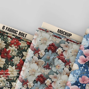 May include: Three fabric bolts with floral patterns. The bolts are stacked on top of each other. The top bolt has a blue background with pink flowers. The middle bolt has a white background with red and blue flowers. The bottom bolt has a black background with red and white flowers. The text "6 FABRIC BOLT" is printed on the bottom bolt. The text "MOCKUP" is printed on the top bolt.