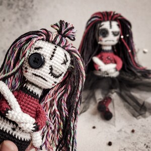Handmade spooky crochet doll, featuring horror-inspired details, perfect for collectors of gothic and horror-themed amigurumi.