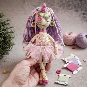 Crochet pattern for a Gothic-inspired amigurumi doll, ideal for spooky handmade decorations or unique gifts.
