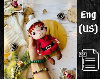 May include: Crochet amigurumi elf doll pattern in English (US). The elf is wearing a red and green outfit with a white hat. The pattern is available as a PDF download.