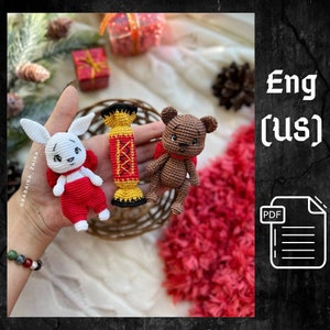 May include: Crochet amigurumi pattern for a white bunny, a brown bear, and a red and yellow candy cane. The pattern is available in English (US) and includes a PDF download.