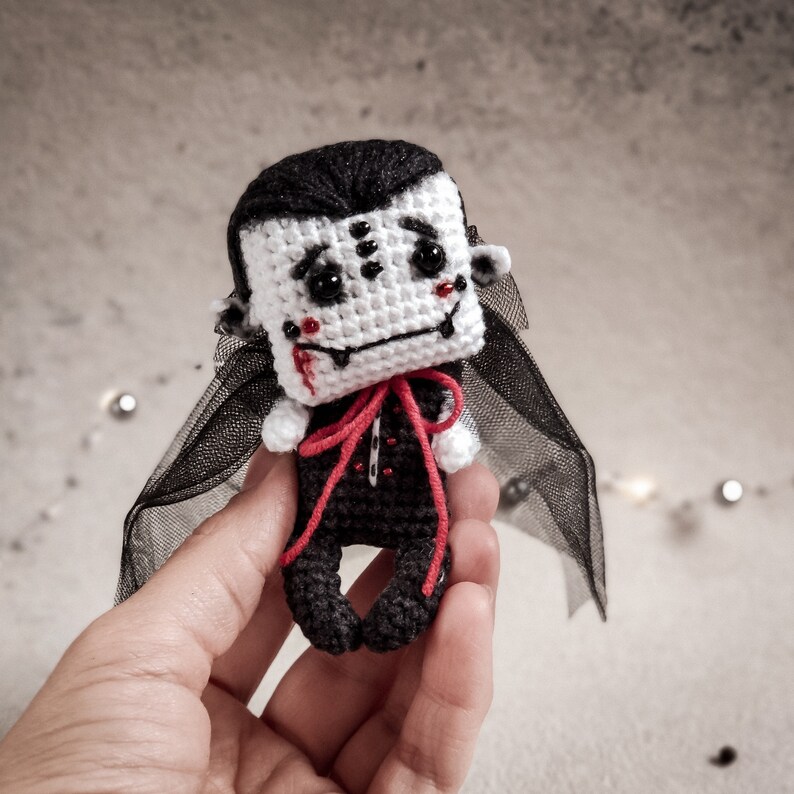 PDF crochet tutorial for crafting a stylish vampire doll. A perfect handmade gift that will bring joy and smiles. Easy-to-follow instructions to create a unique toy.