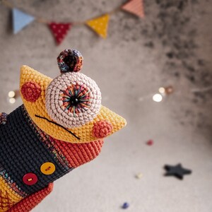 Mr. Lu-Lu crochet plush toy displayed with creative decorations, ideal for seasonal displays or gifts.
