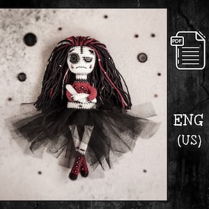 Handmade gothic amigurumi doll with black and red yarn hair, dressed in a spooky black tulle skirt, holding a red heart. A unique Halloween crochet gift for horror and goth lovers.
Crochet voodoo doll amigurumi, with black and red details, a stitched mouth, and a ghostly expression. Perfect for gothic and Halloween-themed decor.