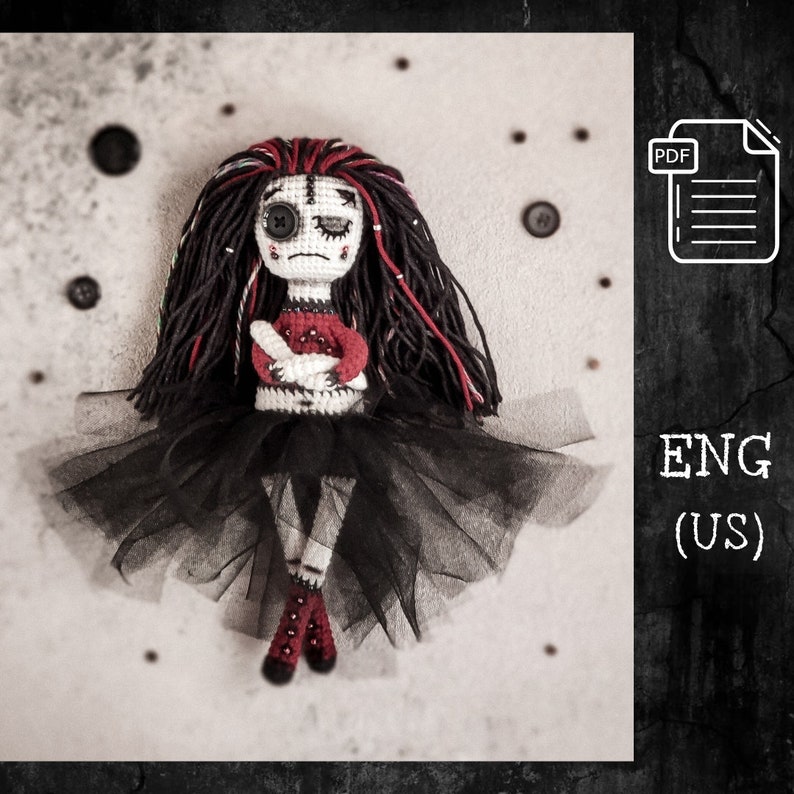 Handmade gothic amigurumi doll with black and red yarn hair, dressed in a spooky black tulle skirt, holding a red heart. A unique Halloween crochet gift for horror and goth lovers.
Crochet voodoo doll amigurumi, with black and red details, a stitched mouth, and a ghostly expression. Perfect for gothic and Halloween-themed decor.