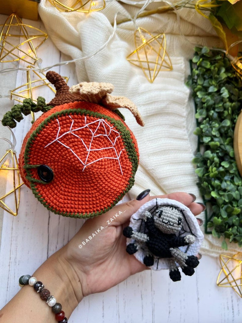 Eco-friendly crochet pumpkin house and spider decor. Ideal for DIY Halloween crafts or handmade gifts. Instant digital download for crochet enthusiasts.