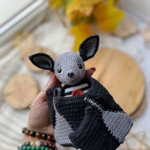 Kawaii crochet bat toy, skeleton style wings, Halloween amigurumi pattern for decor and gifting.