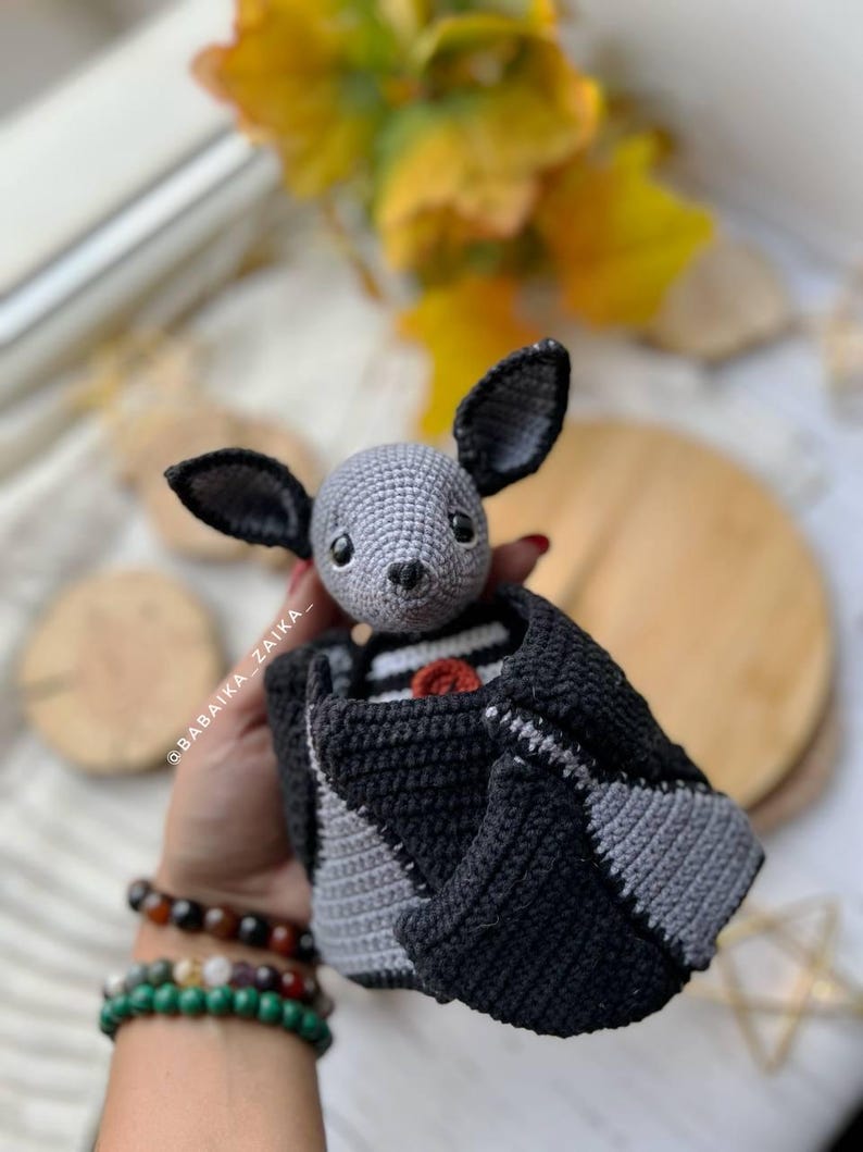 Kawaii crochet bat toy, skeleton style wings, Halloween amigurumi pattern for decor and gifting.