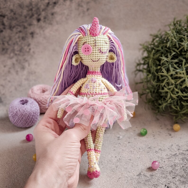Handcrafted amigurumi doll in Gothic style, made with love and eco-friendly materials.