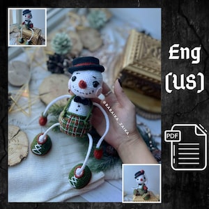 May include: A handmade crochet snowman doll with a black top hat, bow tie, and plaid overalls. The snowman has a carrot nose, rosy cheeks, and green shoes. The doll is approximately 5 inches tall.