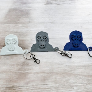 Gorilla Tag Monkey sleutelhanger, Gorilla Tag Virtual Realty karakter, 3D gedrukte gorilla monnik hoofd sleutelhanger, VR Gamer Gift