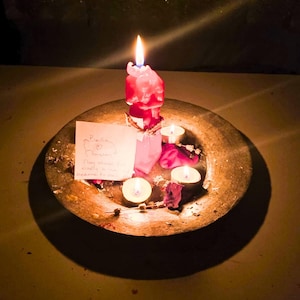 May include: A set of three ceramic nesting bowls in shades of blue, green, and white. The bowls feature a speckled glaze and a simple, modern design. The largest bowl is approximately 8 inches in diameter.