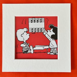 Snoopy Peanuts Schroeder piano mounted print upcycled book page