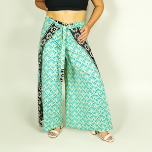 Pantalones cruzados con flores en azul agua l Pantalones de playa Bali l Pantalones cruzados l Pantalones de festival para mujer l Regalo para ella l Pantalón palazzo turquesa