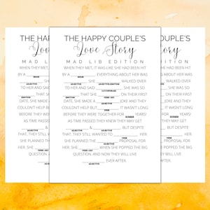 以下が含まれることがあります： 結婚式または婚約パーティー用の印刷可能なマッドリブゲーム。ゲームのタイトルは「幸せなカップルのラブストーリー」で、形容詞、動詞、名詞、数字を記入するスペースがあります。このゲームは、ゲストがカップルのラブストーリーについて学ぶための楽しくインタラクティブな方法として設計されています。