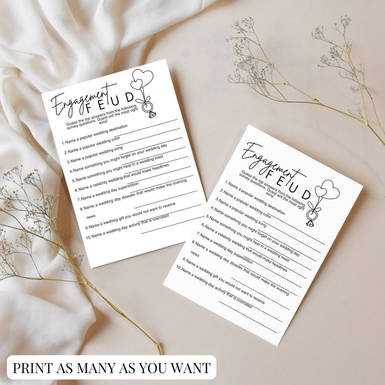May include: Two printable cards with the text "Engagement Feud" and a list of questions for a wedding game. The cards feature a simple illustration of a ring and balloons.