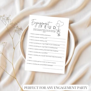 May include: A printable engagement party game called "Engagement Feud" with ten questions to guess the top answers from a survey. The game is designed to be played at an engagement party.