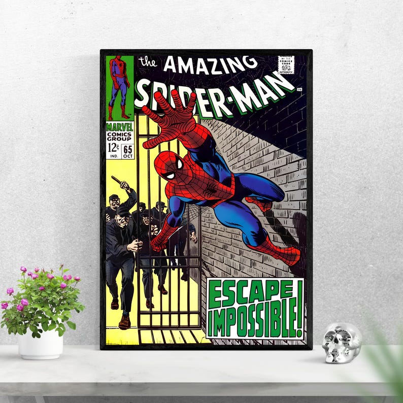 Op de afbeelding: Ingelijste vintage stripboekcover met Spider-Man in actie. De titel "The Amazing Spider-Man" is zichtbaar. De illustratie bevat de tekst "ESCAPE IMPOSSIBLE!" en het Marvel Comics Group-logo.
