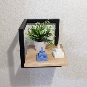Small decorative industrial wall shelf, stepped cube-shaped design, hanging shelf made of wood and metal.