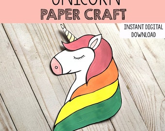 May include: Printable paper craft of a unicorn with a rainbow mane. The unicorn is white with a pink mane and a yellow horn. The mane is made of five layers of paper in the colours of the rainbow. The text "INSTANT DIGITAL DOWNLOAD" is in the top right corner of the image.
