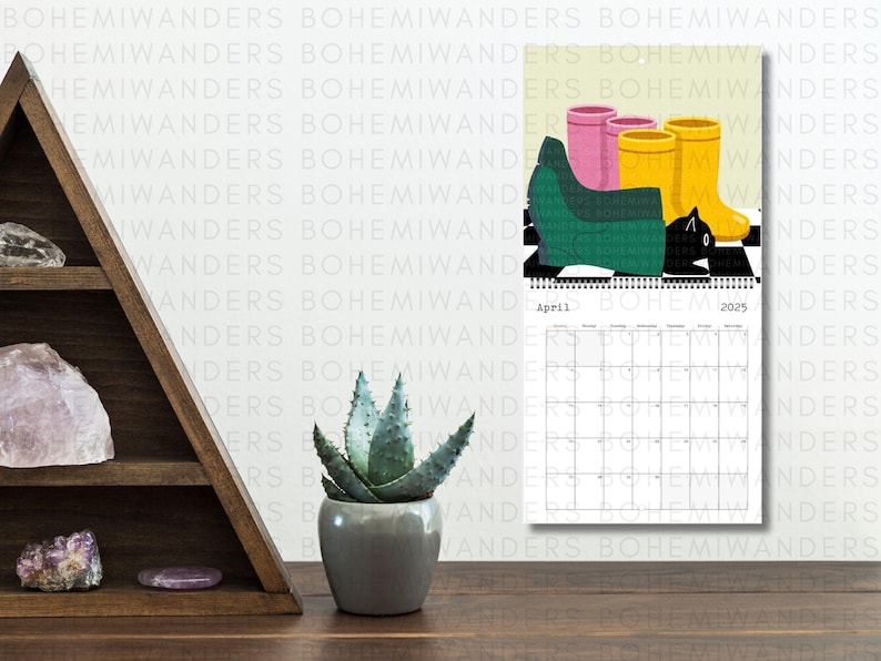 2026 Where’s the Cat? Calendar featuring adorable black cats playing hide-and-seek in everyday scenes. A cute and funny wall calendar for black cat moms and cat lovers. Includes 12 peek-a-boo cat illustrations in a modern square format. Perfect gift for cat moms, black cat owners, and anyone who loves playful feline art