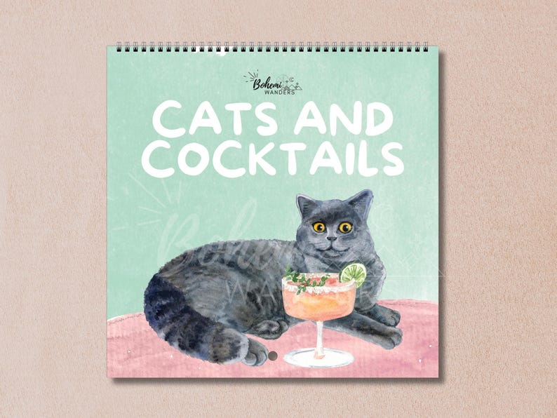 Whimsical watercolor 2026 Cats and Cocktails wall calendar featuring playful cats with pun-inspired drinks like Meowgarita, Purr-secco, and Cat-a-Tonic. A perfect gift for cat moms, cat lovers, and cocktail enthusiasts who enjoy funny cat art, pastel colors, and bar cart decor.