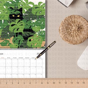 2026 Where’s the Cat? Calendar featuring adorable black cats playing hide-and-seek in everyday scenes. A cute and funny wall calendar for black cat moms and cat lovers. Includes 12 peek-a-boo cat illustrations in a modern square format. Perfect gift for cat moms, black cat owners, and anyone who loves playful feline art