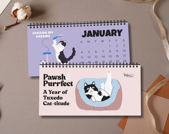 Puede incluir: Dos calendarios de gatos con espiral. El calendario superior muestra el mes de enero con una ilustración de gato en blanco y negro. El calendario inferior tiene el texto "Pawsh & Purrfect" y "A Year of Tuxedo Cat-titude" con una ilustración de gato.