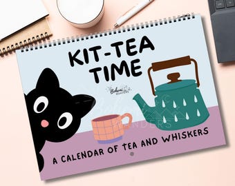 Puede incluir: Calendario encuadernado en espiral con el texto "KIT-TEA TIME" y "A CALENDAR OF TEA AND WHISKERS". Presenta un gato negro, una tetera turquesa y una taza rosa. El fondo es azul claro y rosa.