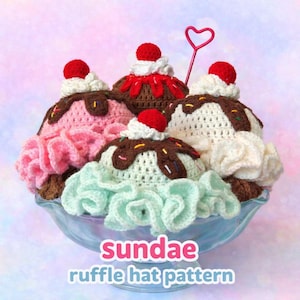 May include: A collection of crocheted sundae hats in a glass bowl. Each hat features a different ice cream flavor, including pink, brown, and white, topped with a cherry and chocolate drizzle. The hats have a ruffle design and are decorated with sprinkles. The text "sundae ruffle hat pattern" is visible.