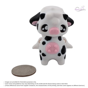 May include: A 3D-printed figurine of a cartoon cow with black spots, ears, and eyes, and a pink nose and belly. The cow has small wings and is standing next to a quarter coin for size comparison.