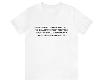 Notre pays ne pourra pas guérir tant que nous n'aurons pas combattu collectivement le fantôme de Ronald Reagan... T-shirt unisexe à manches courtes en jersey