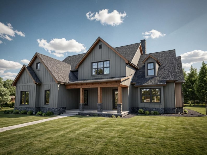 May include: A large, two-story house with a gray exterior, dark roof, and a covered porch. The house has multiple windows and a well-manicured lawn. The sky is blue with fluffy white clouds.