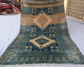 5'4 x 9 フィートのバルーチ ヴィンテージ フェード ラグ