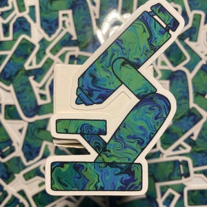 May include: A blue and green swirl patterned microscope sticker. The sticker is on a white background.