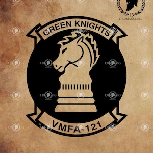 May include: A black and white graphic of a knight chess piece inside a black circle, with the words "GREEN KNIGHTS" and "VMFA-121" on banners. The image includes the text "Digital File - SVG" and a logo with a helmet and the text "13ROMANS.COM".