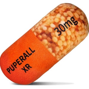 May include: Orange capsule pill with the text "PUPERALL XR" and "30mg" printed on it.