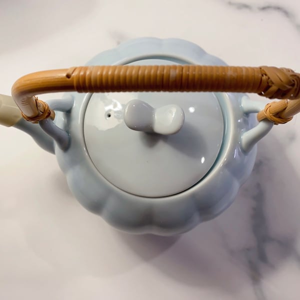 Elegant porcelain light blue teapot