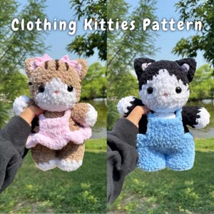 May include: Two fluffy, handmade cat toys. One is brown and white with a pink dress, the other black and white with blue overalls. Both have embroidered faces. The image includes the text "Clothing Kitties Pattern" at the top.
