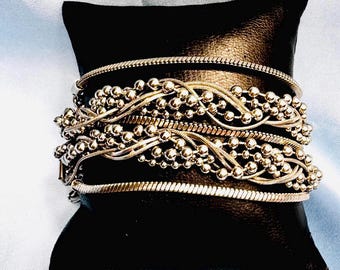 Isadora Silver Tone Multi Strand Braided and Beaded Bracelet