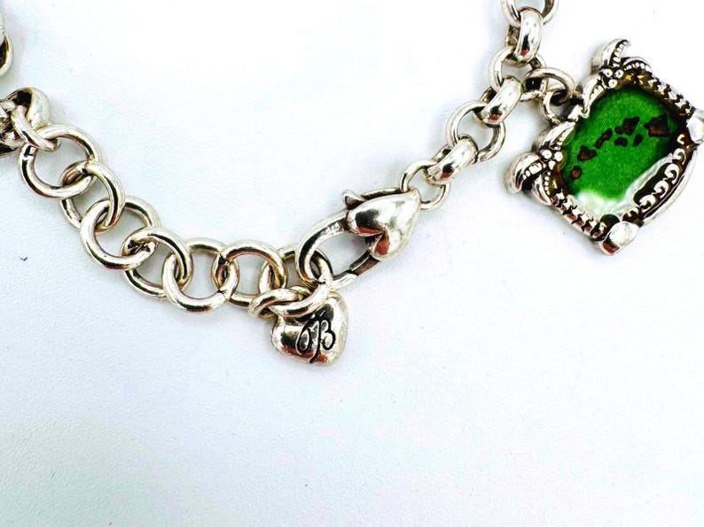 Pulsera de dijes Brighton chapada en plata con temática hawaiana (modelo descatalogado) - 7 dijes imagen 5
