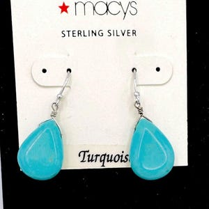 May include: A set of three ceramic mugs with a speckled, matte finish. The mugs are in shades of cream, light gray, and dark gray. Each mug has a simple, minimalist design, perfect for coffee or tea.