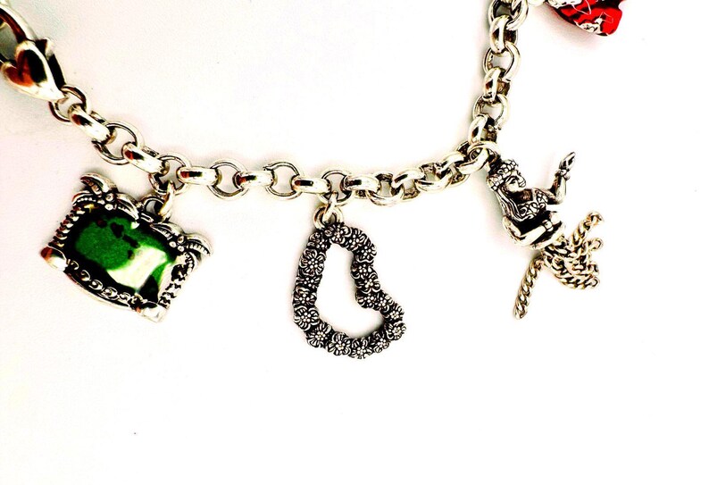 Pulsera de dijes Brighton chapada en plata con temática hawaiana (modelo descatalogado) - 7 dijes imagen 4