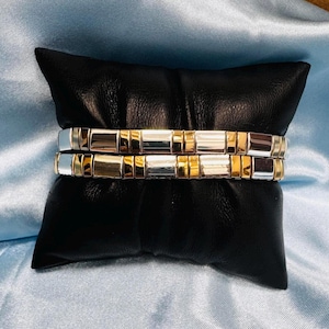 Pulsera de tenis flexible de dos tonos en plata y oro