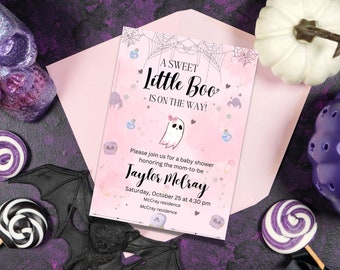 May include: A pink and white baby shower invitation with a ghost illustration and the text "A Sweet Little Boo is on the way!"  The invitation also includes the text "Please join us for a baby shower honoring the mom-to-be Taylor Melray Saturday, October 25 at 4:30 pm McCray residence McCray residence".