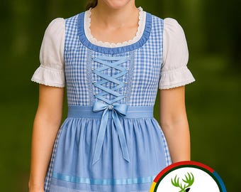May include: A blue and white checkered dirndl dress with a white blouse and a blue apron. The dress has a lace-up bodice and a blue ribbon bow. The logo for Alpen Lifestyle & Trachten is visible.