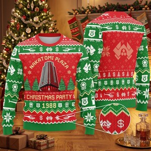 May include: A red and green long-sleeve knit jumper featuring a Nakatomi Plaza Christmas Party 1988 graphic. The design includes helicopters, dollar signs, police badges, and pine trees in a repeating pattern across the front and back.