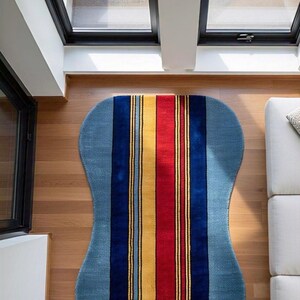 Hand-Tufted Wool Rug: Irregular Shape, Striped Design