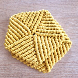 2 Pentagon shaped macramé coasters
