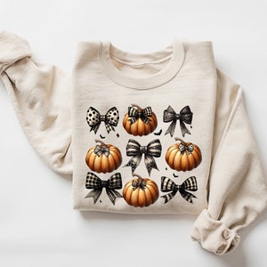 Coquette Halloween Pumpkin Bow Sweatshirt, Fall Shirt for Women, Trendy Halloween Bow Shirt, Pumpkin Floral Shirt, Halloween Gift Sweatshirt